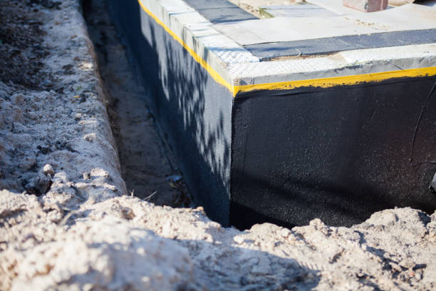 Professional Emergency Waterproofing technician working in Plevna, KS
